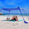 imageSUN NINJA Beach Tent Sun Shelter UPF50  Easy Pop Up Beach Canopy  Outdoor Shade for Camping Trips Fishing Backyard Fun Picnics  Sand Shovel Ground Pegs ampamp Stability PolesRoyal Blue
