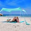 imageSUN NINJA Beach Tent Sun Shelter UPF50  Easy Pop Up Beach Canopy  Outdoor Shade for Camping Trips Fishing Backyard Fun Picnics  Sand Shovel Ground Pegs ampamp Stability PolesGreen